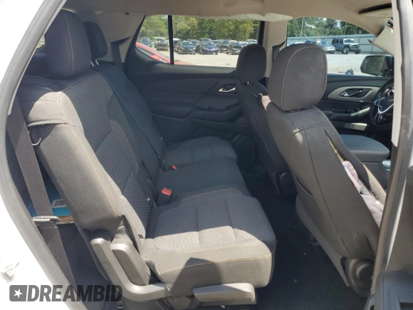 2018 Chevrolet Traverse LS z VIN 1GNERFKW3JJ203354, wystawiony jako Copart lot #54901925 z przebiegiem 110 898 mil mil oraz Szkoda całkowita • Salvage title. Historia ofert i sprzedaży dostępna na DreamBid. Obrazek 11.