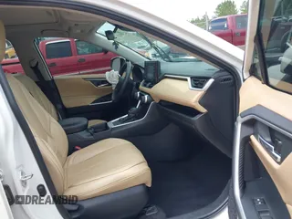 2020 Toyota RAV4 Hybrid XLE with VIN 2T3RWRFV5LW094731, listed as a IAAI auction lot 42349123 with 60,927 mi miles and . Bid and sale history available at DreamBid. Image 5.