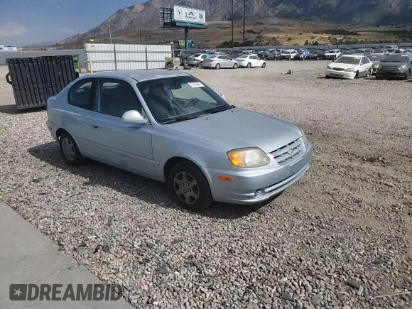 2005 Hyundai Accent GLS with VIN KMHCG35C55U341192, listed as a Copart auction lot 70708994 with 174,872 mi miles and Salvage Title. Bid and sale history available at carsss.com. Image 11.