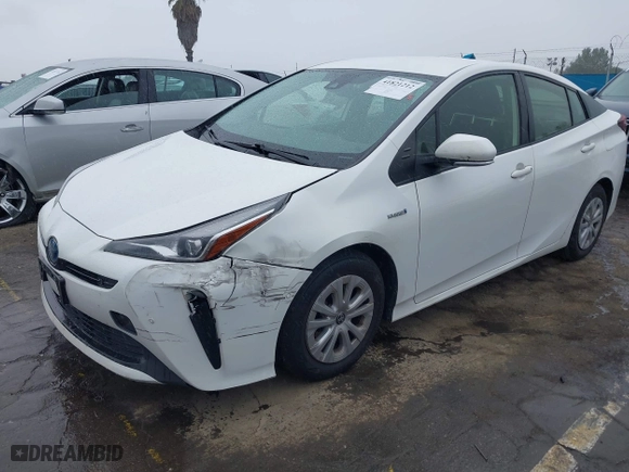 2021 Toyota Prius L Eco with VIN JTDKAMFU6M3141019, listed as a IAAI auction lot 41821212 with 202,756 mi miles. Bid and sale history available at carsss.com. Image 2.