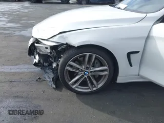 2019 BMW 4 Series 440i with VIN WBA4J5C52KBM65208, listed as a IAAI auction lot 41734154 with 52,477 mi miles and . Bid and sale history available at DreamBid. Image 12.