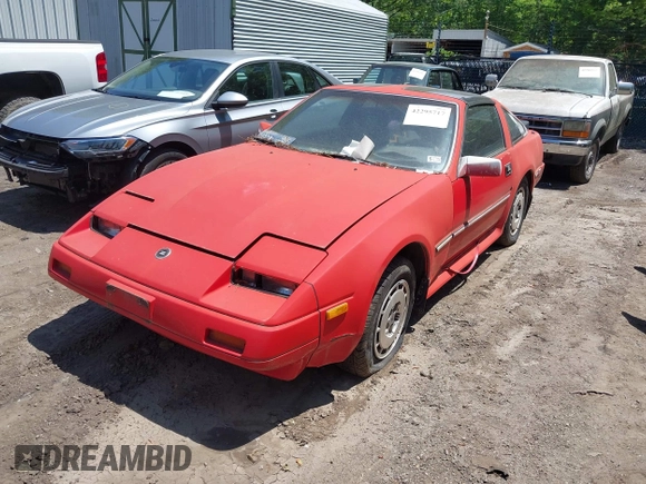 1986 Nissan 300ZX z VIN JN1HZ14S4GX164916, wystawiony jako IAAI lot #42295717 z przebiegiem 254 114 mil mil oraz . Historia ofert i sprzedaży dostępna na DreamBid. Obrazek 2.