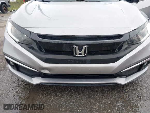 2020 Honda Civic EX-L with VIN 19XFC1F78LE001386, listed as a IAAI auction lot 41961560 with 115,745 mi miles and . Bid and sale history available at DreamBid. Image 6.