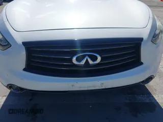 2015 Infiniti QX70 with VIN JN8CS1MU5FM380792, listed as a IAAI auction lot 41946084 with 128,928 mi miles and . Bid and sale history available at DreamBid. Image 6.