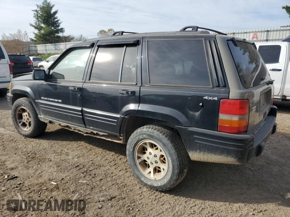 1998 Jeep Grand Cherokee Laredo with VIN 1J4GZ48YXWC299827, listed as a Copart auction lot 76898264 with 232,656 mi miles and Clean Title. Bid and sale history available at carsss.com. Image 2.