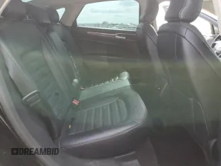 2018 Ford Fusion SE z VIN 3FA6P0HD8JR217719, wystawiony jako Copart lot #53429555 z przebiegiem 108 953 mil mil oraz Szkoda całkowita • Salvage title. Historia ofert i sprzedaży dostępna na DreamBid. Obrazek 10.