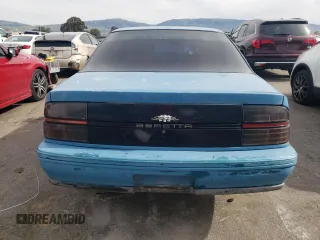 1994 Chevrolet Beretta z VIN 1G1LV15MXRY284860, wystawiony jako Copart lot #41469764 z przebiegiem 209 461 mil mil oraz Czysty tytuł • Clean title. Historia ofert i sprzedaży dostępna na DreamBid. Obrazek 6.