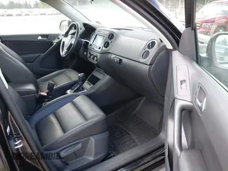 2012 Volkswagen Tiguan SE with VIN WVGBV7AX5CW561368, listed as a IAAI auction lot 42197389 with 63,809 mi miles and . Bid and sale history available at DreamBid. Image 5.