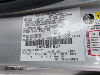 2011 Ford Fusion Hybrid with VIN 3FADP0L33BR126557, listed as a IAAI auction lot 42523235 with 179,867 mi miles and . Bid and sale history available at DreamBid. Image 9.