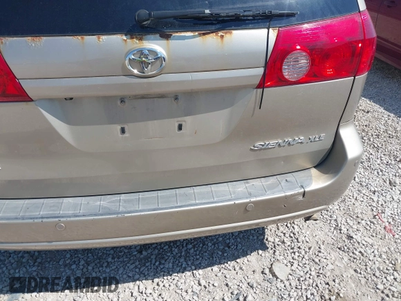 2009 Toyota Sienna XLE with VIN 5TDZK22CX9S257522, listed as a IAAI auction lot 42113875 with 214,873 mi miles. Bid and sale history available at carsss.com. Image 14.