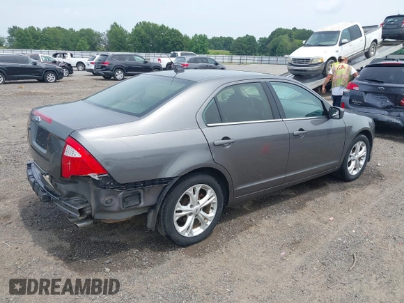 2012 Ford Fusion SE with VIN 3FAHP0HA9CR141588, listed as a IAAI auction lot 42485632 with 124,312 mi miles and . Bid and sale history available at DreamBid. Image 4.