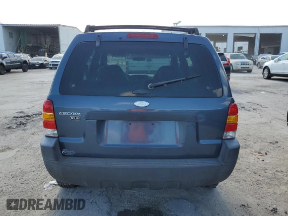 2001 Ford Escape XLS with VIN 1FMYU01BX1KB53168, listed as a Copart auction lot 76547834 with 71,025 mi miles and Salvage title. Bid and sale history available at DreamBid. Image 6.