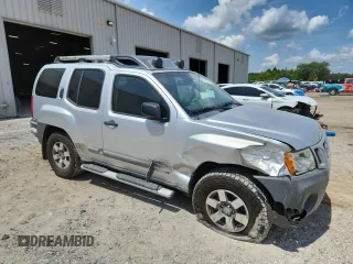 2010 Nissan Xterra S with VIN 5N1AN0NWXAC512573, listed as a Copart auction lot 60401525 with 109,358 mi miles and Salvage title. Bid and sale history available at DreamBid. Image 4.