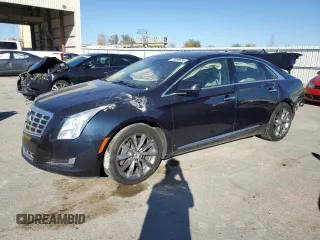 2014 Cadillac XTS z VIN 2G61L5S39E9300636, wystawiony jako Copart lot #78068634 z przebiegiem 117 549 mil mil oraz Szkody całkowita. Historia ofert i sprzedaży dostępna na DreamBid. Obrazek 1.