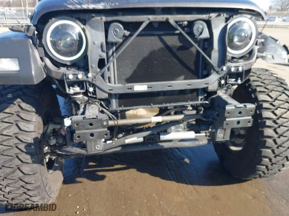 2019 Jeep Wrangler Unlimited Sport S with VIN 1C4HJXDG2KW612913, listed as a IAAI auction lot 41519311 with 104,583 mi miles. Bid and sale history available at carsss.com. Image 18.