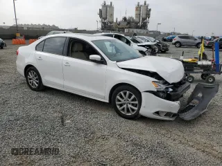 2012 Volkswagen Jetta SE with VIN 3VWDP7AJ9CM364672, listed as a Copart auction lot 61309775 with 124,965 mi miles and Salvage title. Bid and sale history available at DreamBid. Image 4.
