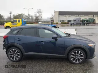 2019 Mazda CX-3 Touring with VIN JM1DKDC79K0424436, listed as a IAAI auction lot 41579280 with 76,989 mi miles. Bid and sale history available at carsss.com. Image 14.