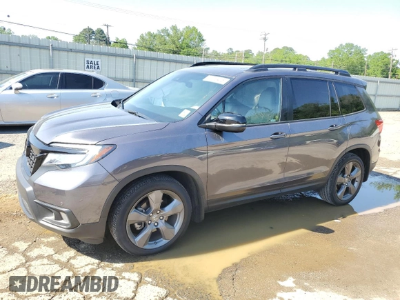 2021 Honda Passport Touring z VIN 5FNYF7H97MB011307, wystawiony jako Copart lot #52310415 z przebiegiem 72 118 mil mil oraz Szkoda całkowita • Salvage title. Historia ofert i sprzedaży dostępna na DreamBid. Obrazek 1.