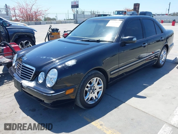 2002 Mercedes-Benz E-Class with VIN WDBJF65J62B404868, listed as a IAAI auction lot 42121837 with 107,415 mi miles. Bid and sale history available at carsss.com. Image 2.