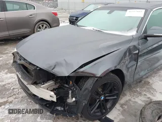 2016 BMW 4 Series 428i xDrive with VIN WBA3T1C56GP822270, listed as a IAAI auction lot 41557665 with 116,637 mi miles and . Bid and sale history available at carsss.com. Image 6.