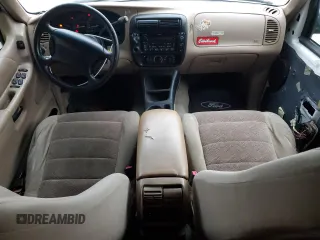 2000 Ford Explorer XLT z VIN 1FMZU73E2YZB82279, wystawiony jako Copart lot #86607864 z przebiegiem 46 620 mil mil oraz Szkody całkowita. Historia ofert i sprzedaży dostępna na DreamBid. Obrazek 8.