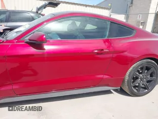 2018 Ford Mustang EcoBoost z VIN 1FA6P8TH2J5137943, wystawiony jako IAAI lot #41782395 z przebiegiem 148 809 mil mil oraz . Historia ofert i sprzedaży dostępna na DreamBid. Obrazek 13.