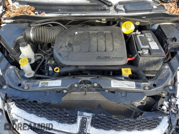 2019 Dodge Grand Caravan SE with VIN 2C4RDGBG8KR704535, listed as a Copart auction lot 42096825 with 51,060 mi miles and Salvage Title. Bid and sale history available at DreamBid. Image 12.