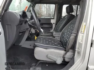 2007 Jeep Wrangler Unlimited X with VIN 1J4GA39177L105582, listed as a Copart auction lot 88912935 with 156,156 mi miles and Salvage Title. Bid and sale history available at DreamBid. Image 7.