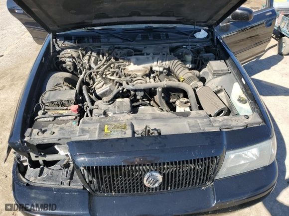 2003 Mercury Marauder with VIN 2MEHM75VX3X655842, listed as a Copart auction lot 74397554 with 185,413 mi miles and Salvage Title. Bid and sale history available at carsss.com. Image 11.