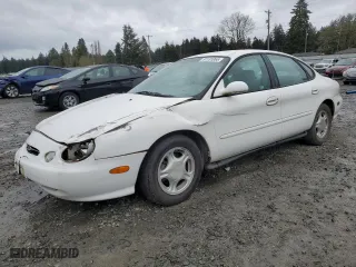 1998 Ford Taurus LX with VIN 1FAFP52U4WG195867, listed as a Copart auction lot 51131065 with 132,211 mi miles and Salvage Title. Bid and sale history available at carsss.com. Image 1.