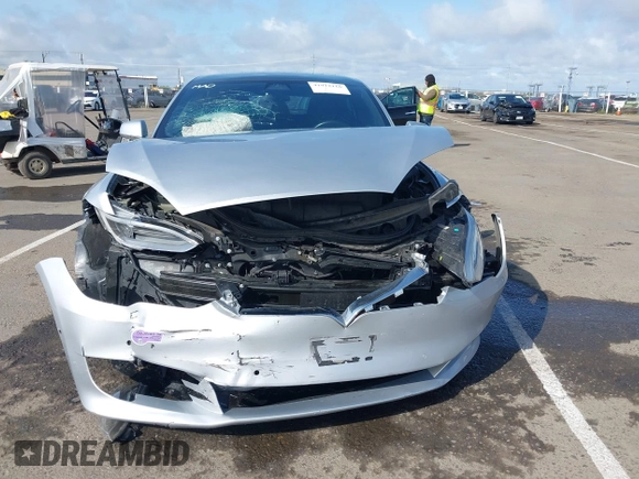 2018 Tesla Model S 75D with VIN 5YJSA1E2XJF287825, listed as a IAAI auction lot 41912116 with Not Provided miles and . Bid and sale history available at DreamBid. Image 6.