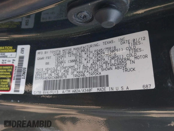 2012 Toyota Tacoma with VIN 5TFPX4ENXCX009676, listed as a IAAI auction lot 40458050 with 101,908 mi miles and . Bid and sale history available at DreamBid. Image 9.