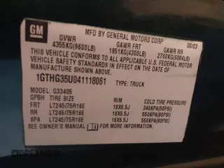 2004 GMC Savana Cargo Van with VIN 1GTHG35U041118061, listed as a IAAI auction lot 41296799 with 185,939 mi miles. Bid and sale history available at carsss.com. Image 9.