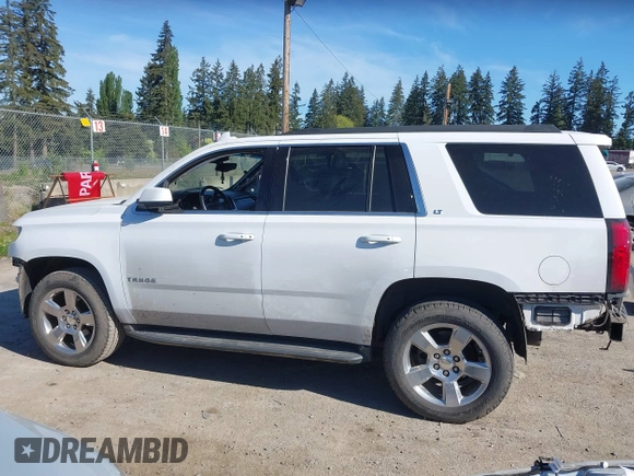 2016 Chevrolet Tahoe LT with VIN 1GNSKBKC9GR272257, listed as a IAAI auction lot 42193967 with 101,967 mi miles and . Bid and sale history available at DreamBid. Image 15.