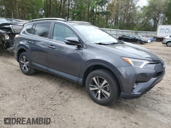 2018 Toyota RAV4 XLE with VIN 2T3WFREV6JW409330, listed as a Copart auction lot 51284165 with 83,689 mi miles and Salvage Title. Bid and sale history available at DreamBid. Image 4.