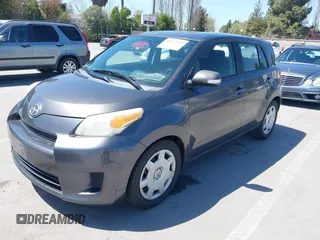 2008 Scion xD with VIN JTKKU10438J027228, listed as a IAAI auction lot 41973795 with 205,044 mi miles. Bid and sale history available at carsss.com. Image 2.