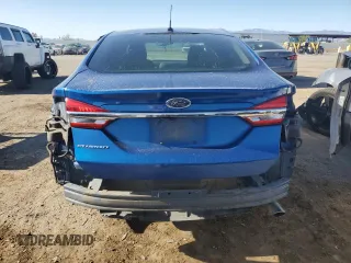 2017 Ford Fusion S with VIN 3FA6P0G77HR294331, listed as a Copart auction lot 54445275 with 106,561 mi miles and Salvage Title. Bid and sale history available at DreamBid. Image 6.