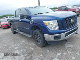 2019 Nissan Titan XD SV with VIN 1N6BA1F46KN514637, listed as a IAAI auction lot 41986617 with 123,872 mi miles. Bid and sale history available at carsss.com. Image 1.
