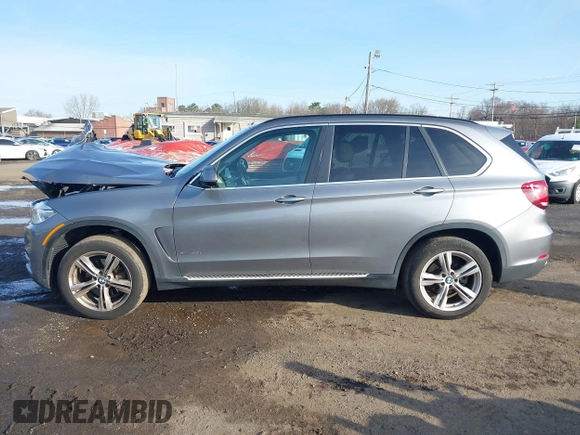 2014 BMW X5 xDrive35i z VIN 5UXKR0C52E0H19670, wystawiony jako IAAI lot #41909590 z przebiegiem 137 758 mil mil oraz . Historia ofert i sprzedaży dostępna na DreamBid. Obrazek 14.