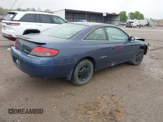 1999 Toyota Solara SE with VIN 2T1CF22P9XC113933, listed as a IAAI auction lot 41975806 with 239,883 mi miles. Bid and sale history available at carsss.com. Image 4.