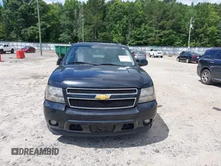 2010 Chevrolet Suburban LT z VIN 1GNUCJE08AR192831, wystawiony jako IAAI lot #42534754 z przebiegiem 165 741 mil mil oraz . Historia ofert i sprzedaży dostępna na DreamBid. Obrazek 12.