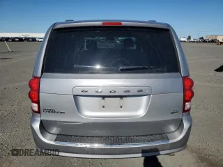 2014 Dodge Grand Caravan SXT with VIN 2C4RDGCG4ER478657, listed as a Copart auction lot 55691085 with 139,681 mi miles and Salvage Title. Bid and sale history available at DreamBid. Image 6.