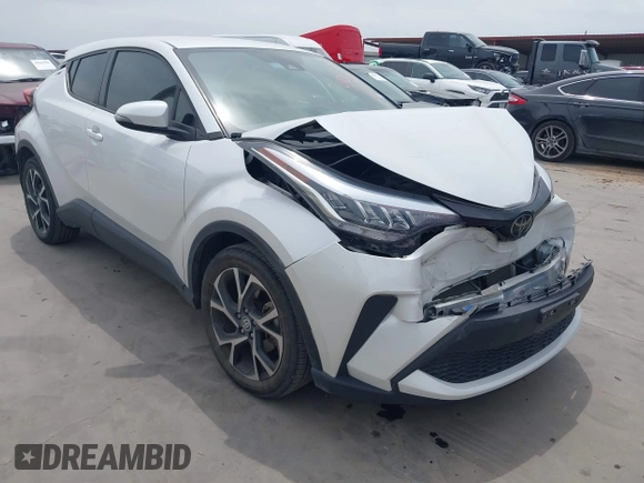 2022 Toyota C-HR XLE z VIN NMTKHMBX2NR144638, wystawiony jako IAAI lot #42063325 z przebiegiem 22 823 mil mil oraz . Historia ofert i sprzedaży dostępna na DreamBid. Obrazek 1.