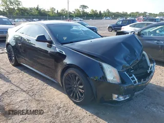 2013 Cadillac CTS Premium z VIN 1G6DP1E34D0126800, wystawiony jako IAAI lot #42328239 z przebiegiem 85 061 mil mil oraz . Historia ofert i sprzedaży dostępna na DreamBid. Obrazek 1.