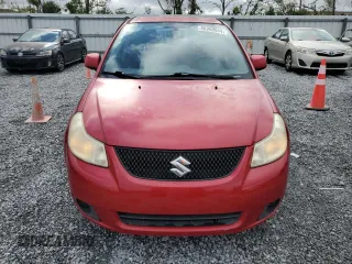 2012 Suzuki SX4 LE with VIN JS2YC5A39C6300577, listed as a Copart auction lot 86998944 with 103,354 mi miles and Non Repairable. Bid and sale history available at carsss.com. Image 5.