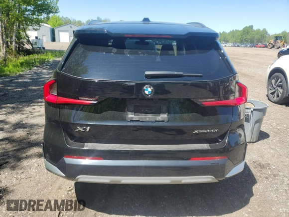 2023 BMW X1 xDrive28i with VIN WBX73EF04P5X86962, listed as a Copart auction lot 57575815 with 95,965 mi miles and Salvage title. Bid and sale history available at DreamBid. Image 6.