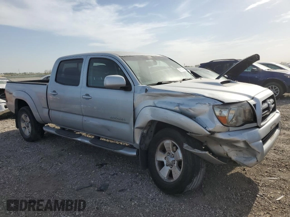 2005 Toyota Tacoma PreRunner with VIN 3TMKU72N65M003911, listed as a Copart auction lot 49546495 with 281,611 mi miles and Salvage title. Bid and sale history available at DreamBid. Image 4.