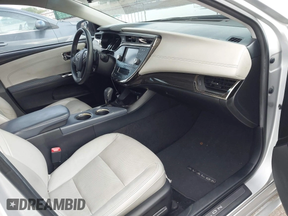 2014 Toyota Avalon Limited with VIN 4T1BK1EB0EU114837, listed as a IAAI auction lot 40051759 with 92,379 mi miles and . Bid and sale history available at DreamBid. Image 5.