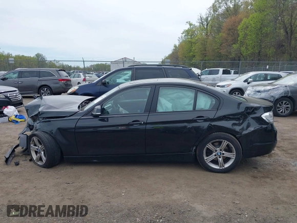 2014 BMW 3 Series 320i xDrive with VIN WBA3C3C59EF984070, listed as a IAAI auction lot 42063569 with 169,002 mi miles and . Bid and sale history available at DreamBid. Image 14.