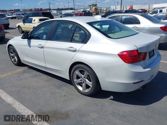 2013 BMW 3 Series 328i with VIN WBA3A5C51DF352812, listed as a IAAI auction lot 41974158 with 176,951 mi miles. Bid and sale history available at carsss.com. Image 3.